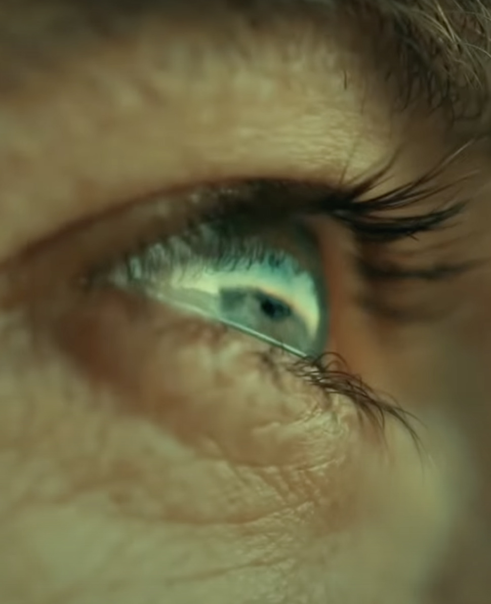 Close-up of a human eye, representing ambition and a forward-looking vision for the future